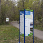 A wayfinding map sign on posts for pedestrians