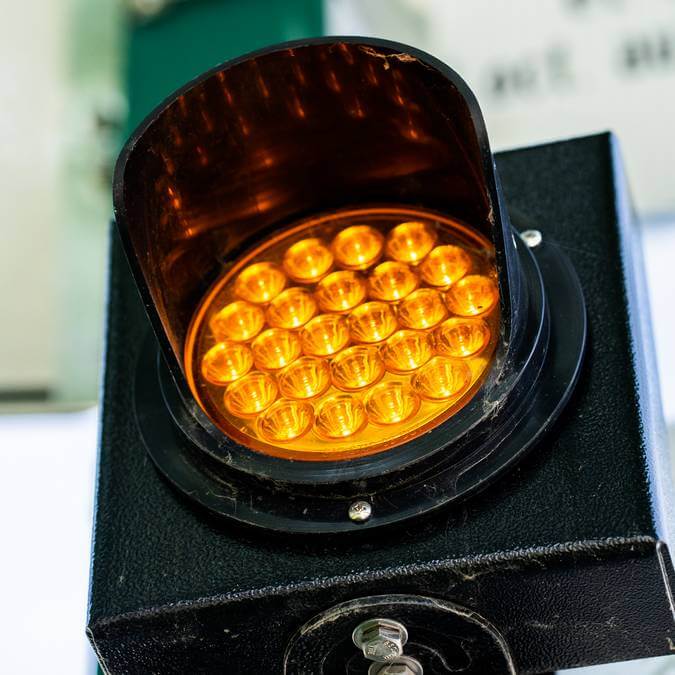 An orange traffic light sensor